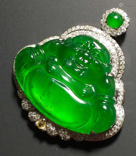 A GREEN JADEITE CARVED BUDDHA PENDANT, TYPE A