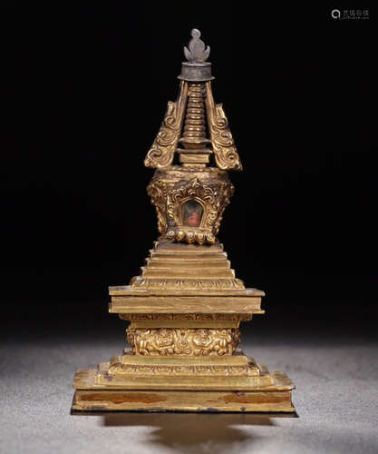 A GILT BRONZE BUDDHISTIC STUPA