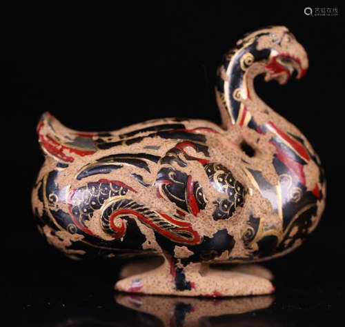 A PAINTED LACQUER PHOENIX SHAPED PENDANT