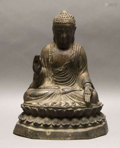 Statuette de Bouddha en bronze patiné représenté a…