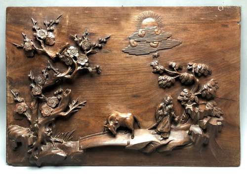 Panneau en bois sculpté à décor d’un sage (Lao Tse…