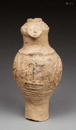Vase cultuel présentant un buste stylisé à décor d…
