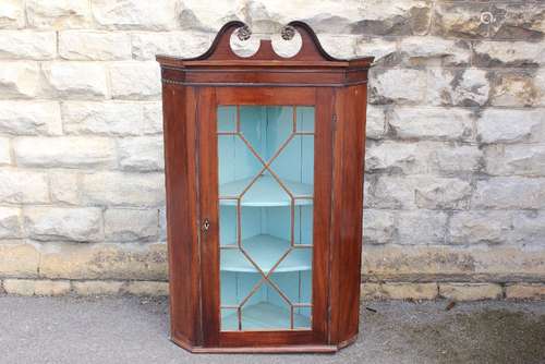 A Victorian Mahogany Glaze Fronted Corner Cabinet, the cabinet having decorative inlay with carved cornice, approx 84 x 50 x 135 cms