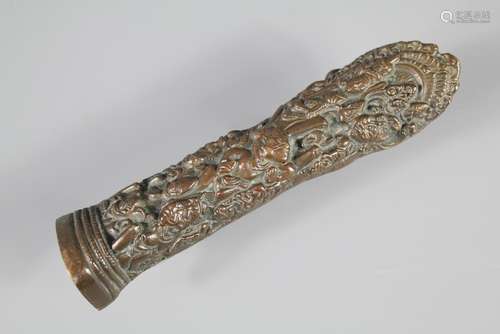 An Indian Bronze Door Handle: the handle decorated with figures and measuring approx 18 x 4 cms