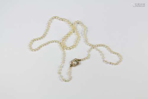 A Very Fine Cultured Pearl Necklace, with yellow gold and diamond clasp, approx 42 cms l