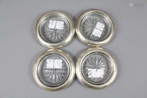 Four Sterling Silver Cut - Glass Coasters