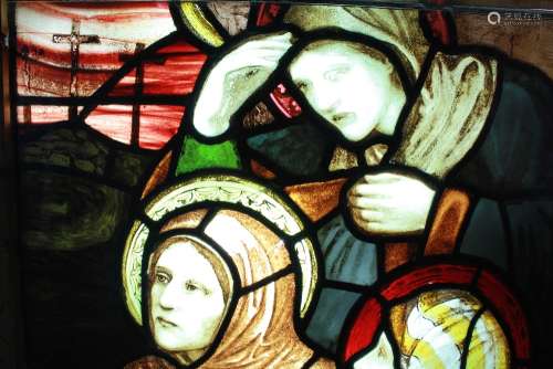 An Antique Stained Glass Window: The window depicting three women weeping at The Cross, approx 120 x 55 cms,