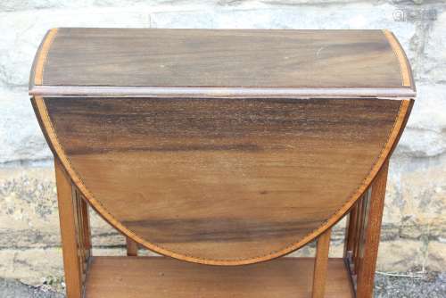 An Edwardian Oval Drop Leaf Table