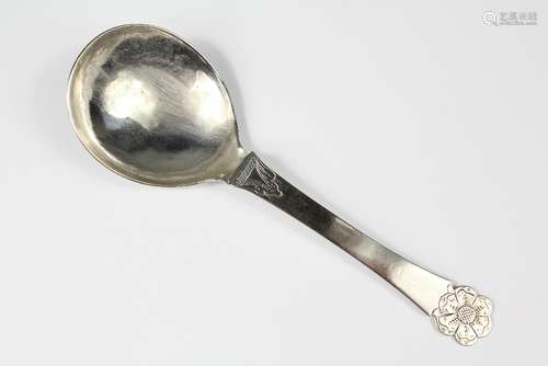 An 18th Century Silver Marriage Spoon, the spoon with deep bowl engraved to verso FBS & TAD dated 1733, with a floral finial, mm BB, approx 7 cms