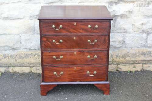 A Reproduction Mahogany Chest of Drawers, with four long drawers on bracket feet, approx 64 w x 44