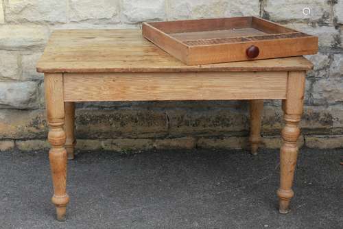 A Scrubbed Pine Kitchen Table: the table having a single cutlery drawer to one side, turned legs, approx 125 x 88 x 76 cms