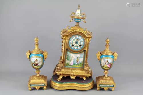A 20th Century French Brass and Porcelain Clock and Garniture