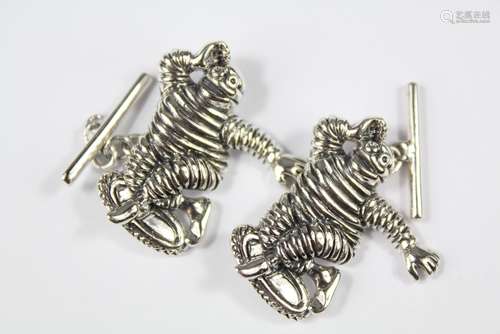 A Pair of Gentleman's Silver Cufflinks, modelled as the Michelin man, approx 10