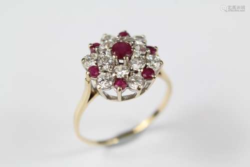 A 9ct Ruby and CZ Cluster Ring, set with one central 3