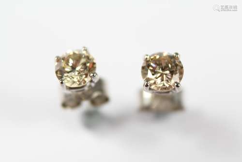 A Pair of Lady's Diamond Stud Earrings, set with approx 77 pts of dias, approx 0