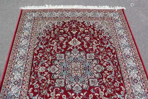 A Red Ground Keshan Rug