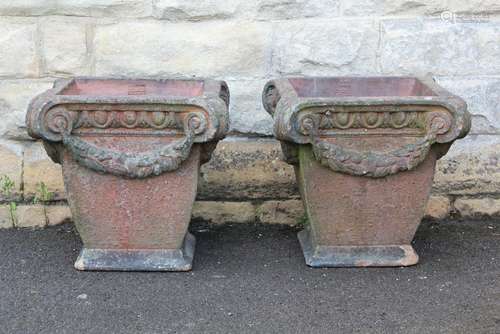 A Pair of Early 20th Century Liberty & Co Terracotta Garden Planters, with garland decoration in relief, approx 47 x 47 x 47 cms, bears the stamp designed by Liberty & Co In the early 20th Century the Regent Street Retailers offered a range of garden ornaments, manufactured by Compton Pottery, the arrangement ended just after WWI