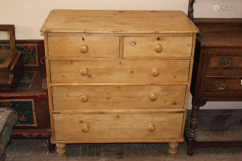 An Antique Stripped Pine Chest of Drawers: two short and three long drawers, on carved feet, approx 93 x 45 x 95 cms