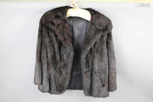 A Lady's Black Mink Short Coat, size 10 or 12, lovely overall condition