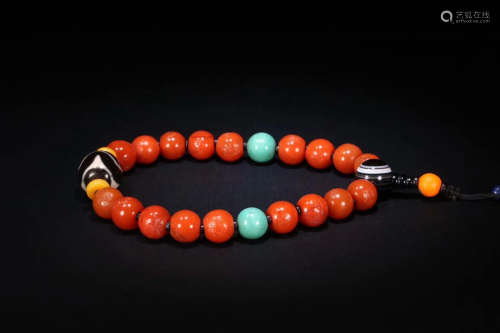 A RED AGATE BRACELET OF 18 BEADS