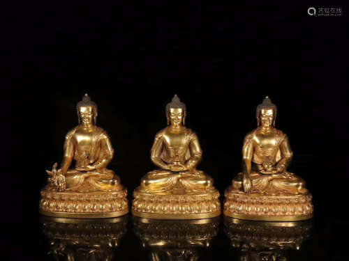 THREE GILT BRONZE BUDDHAS