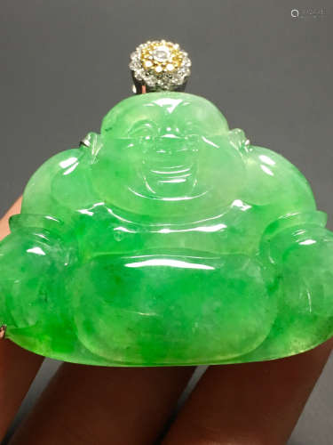 AN ICY ZHENGYANG GREEN JADEIET PENDANT IN BUDDHA SHAPED