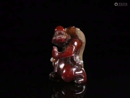 AN ANTIQUE JADE ORNAMENT OF BEAST SHAPED