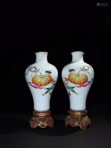 PAIR OF ENAMELED VASES WITH GILT SILVER BASES