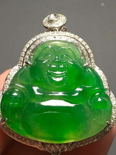 AN ICY ZHENGYANG GREEN JADEIET PENDANT IN BUDDHA SHAPED