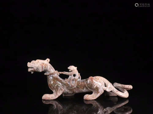 AN ANTIQUE JADE ORNAMENT OF DRAGON CARVING