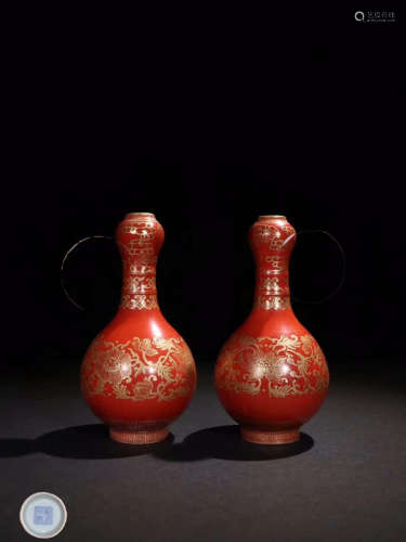 PAIR OF RED PORCELAIN VASES WITH OUTLINE IN GOLD