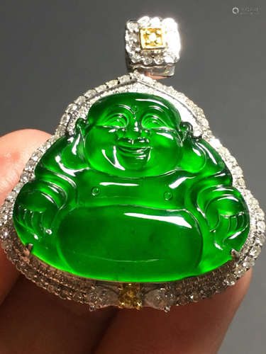 AN ICY ZHENGYANG GREEN JADEIET PENDANT IN BUDDHA SHAPED