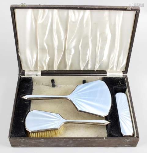 A 1930's cased silver and enamel part dressing table set,