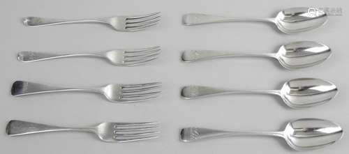 A selection of George III and IV silver dessert spoons and forks,