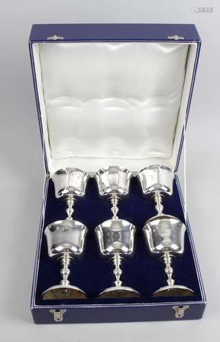 A cased set of six modern silver goblets,