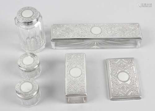 A Victorian silver lidded and glass part dressing table set,