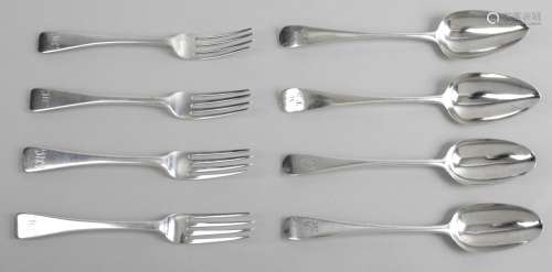 A selection of George III and IV silver table spoons and forks,