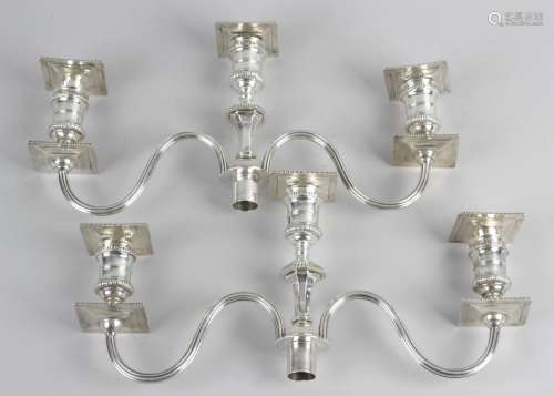 A pair of late nineteenth/early twentieth century candelabra tops,