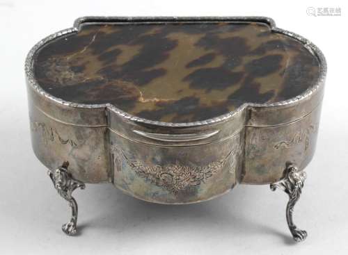 An Edwardian silver mounted and tortoiseshell jewellery casket of trefoil form,
