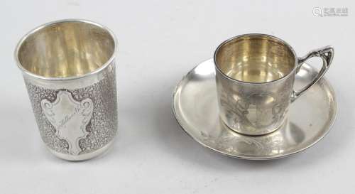 A German silver coffee cup and saucer,