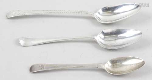 A George III silver table spoon in Old English pattern with bright-cut edge and monogrammed