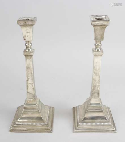 A pair of 1930's silver candlesticks,