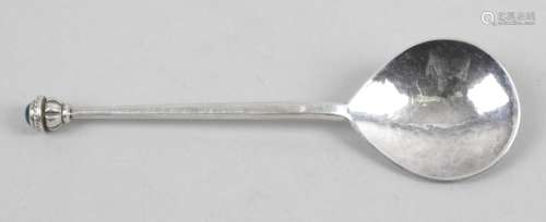 A modern silver Arts & Crafts style spoon by the Guild of Handicraft,