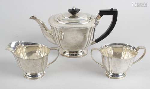 A 1930's matched silver three piece tea set,