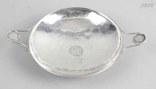 A silver twin-handled dish of circular form,