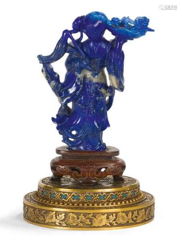 Statuette en lapis lazuli représentant une déesse …