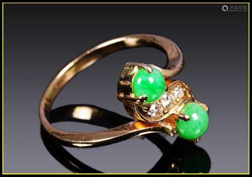 BAGUE or jaune 14 carats sertie de deux cabochons ...;