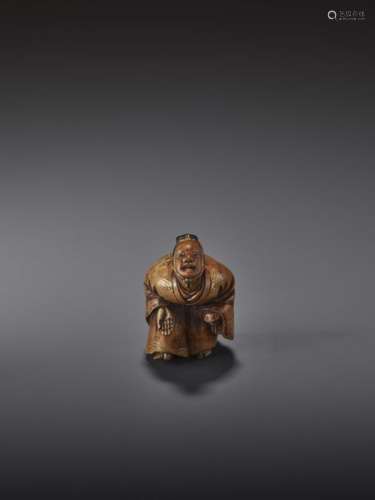 A LACQUERED WOOD NETSUKE OF A DANCER