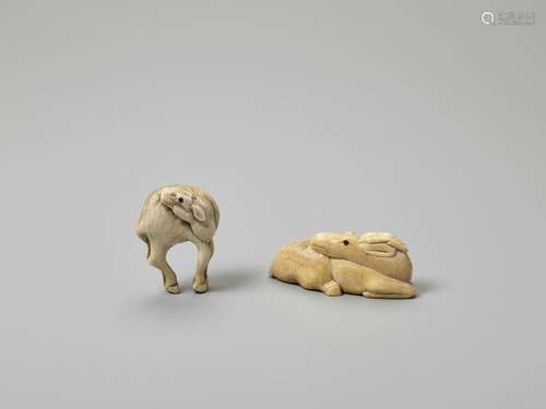 TWO IVORY NETSUKE OF DEER