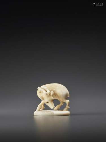 AN IVORY NETSUKE OF A STAG ON BASE BY RANSEN